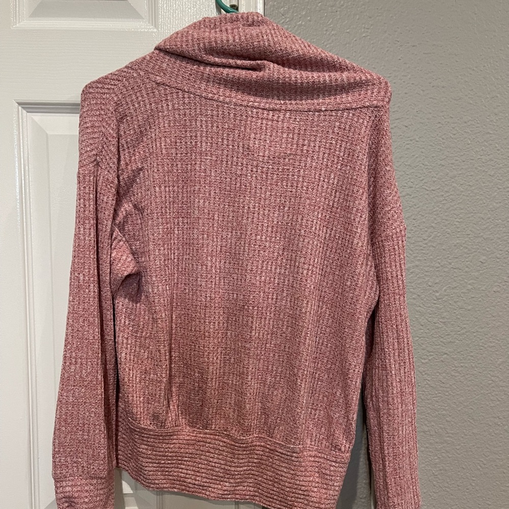 Beautiful pink rose knit sweater with cowl neck to add comfort and style.